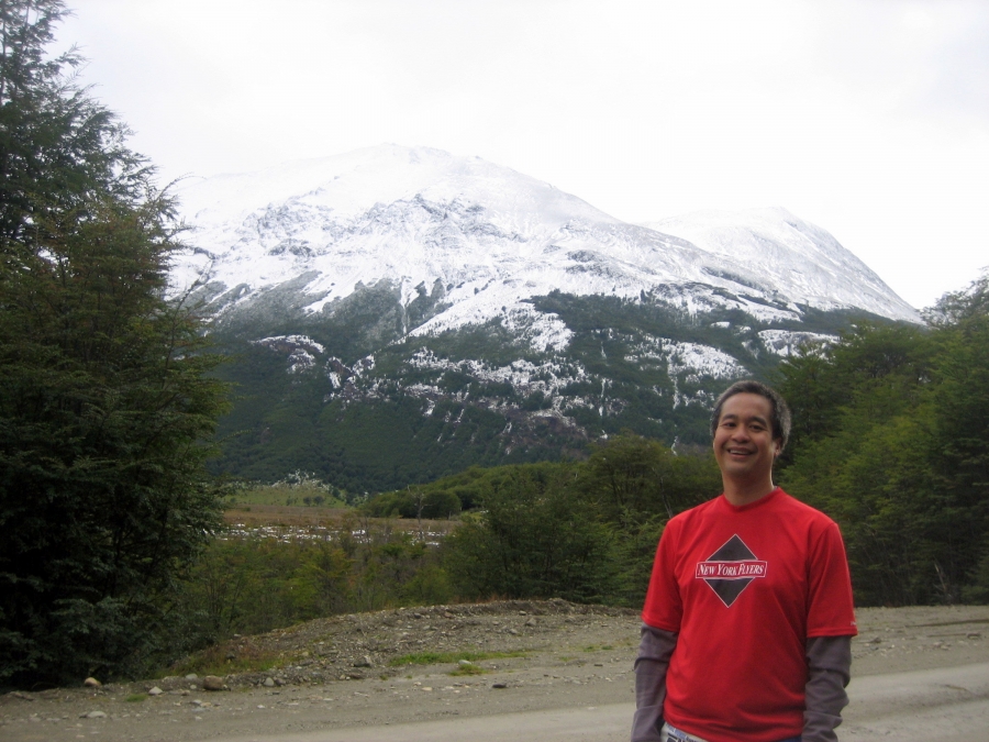 Nick Jesdanun next to a mountain